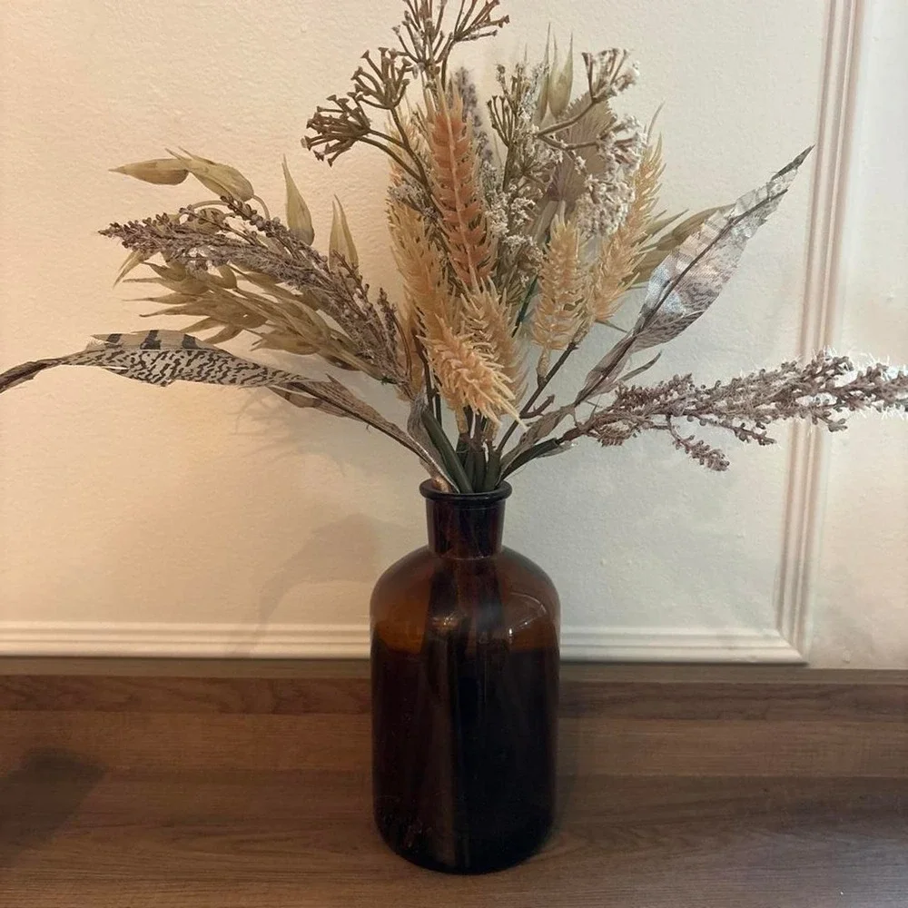 Brown glass vase with fake dried flowers Glass is 7